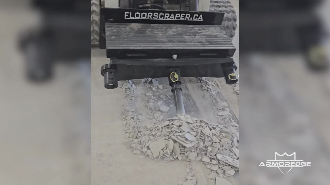 ArmorEdge XDS skid steer floor scraper removing flooring material on a job site – heavy-duty surface preparation attachment demo video